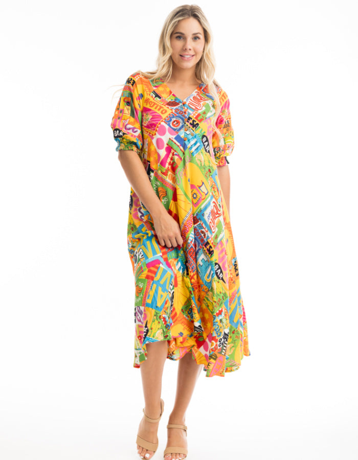 mexican themed printed swing dress, below the knee length with elbow length sleeves in bright colourful shades, yellow pink green and blue. very fun