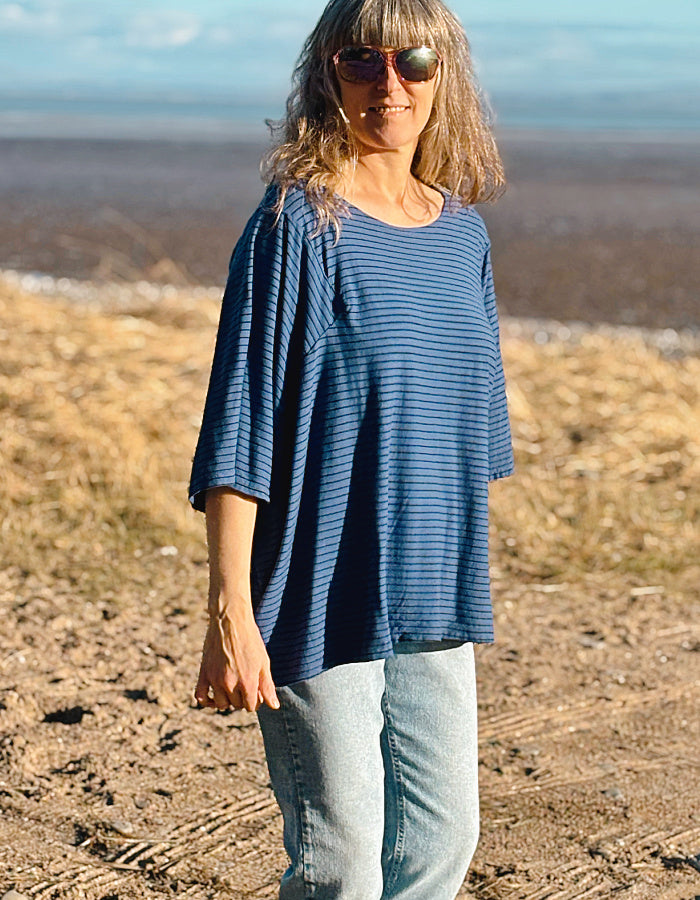 one size big top with round neckline and blocked out elbow sleeves in navy with black stripes