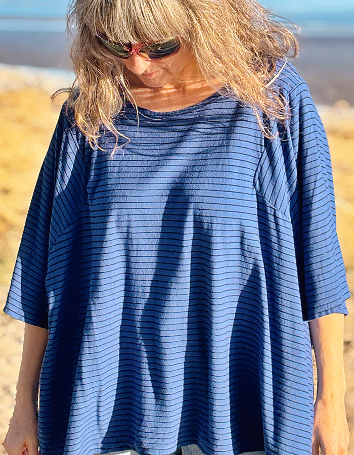 one size big top with round neckline and blocked out elbow sleeves in navy with black stripes