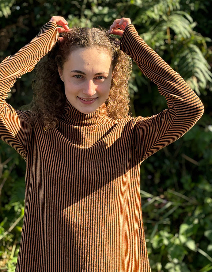 orange and black striped turtle neck with swing shape