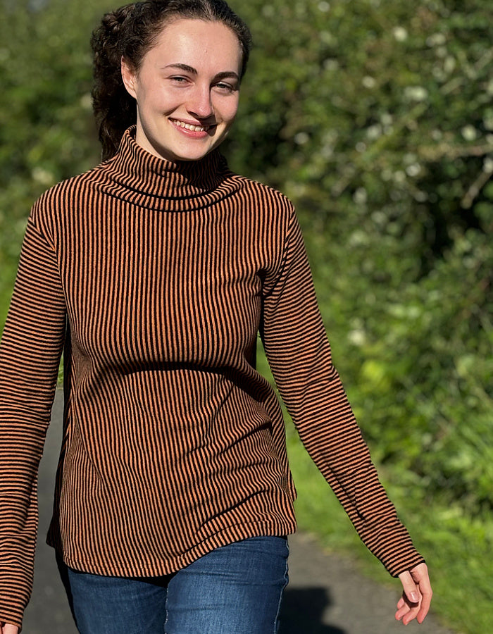 orange and black striped turtle neck with swing shape