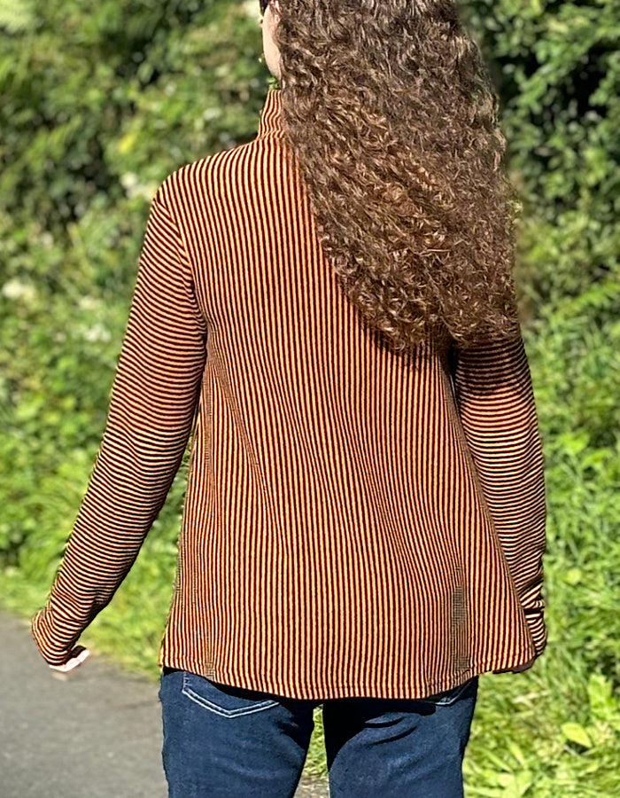 orange and black striped turtle neck with swing shape