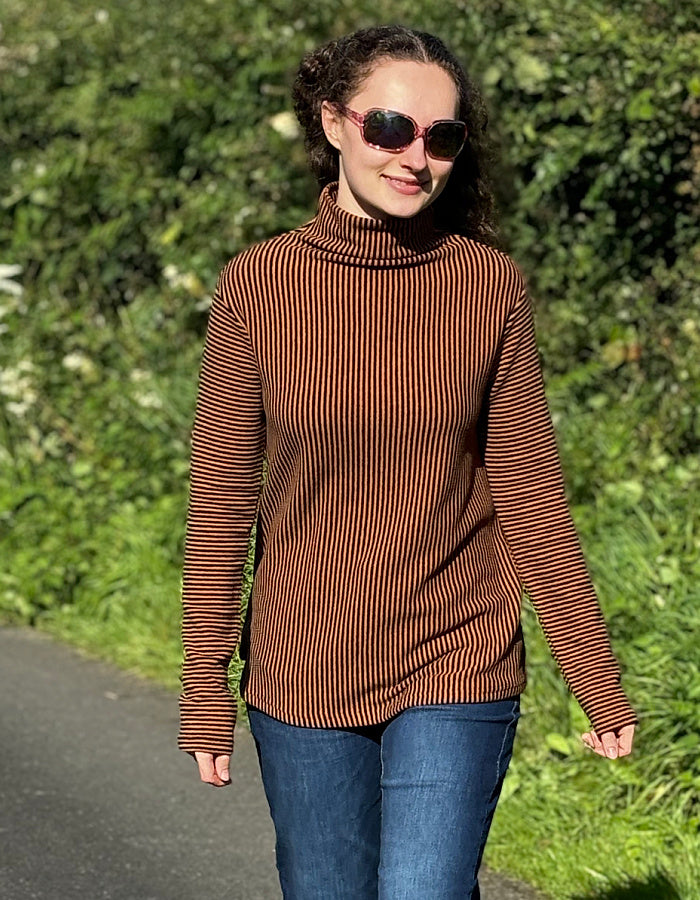 orange and black striped turtle neck with swing shape