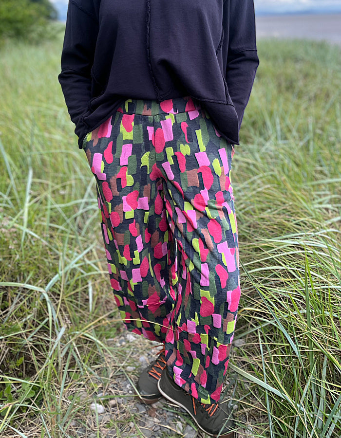 cotton jersey lantern shaped trousers with pink green and lime paint dash print
