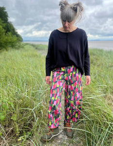 cotton jersey lantern shaped trousers with pink green and lime paint dash print