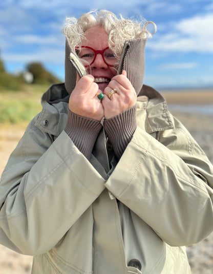 waterproof beige parka coat with hood and ribbed cuffs and stand up collar