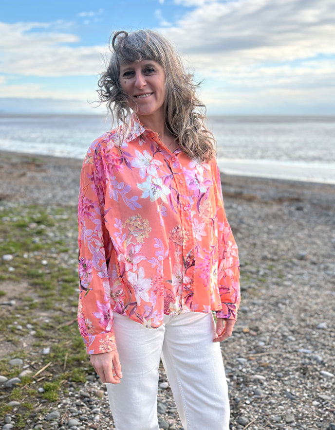 cream jeans with a peach and cream floral cotton blouse
