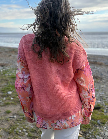 knitted wool tank waistcoat worn over a floral cotton blouse in peach and pink florals