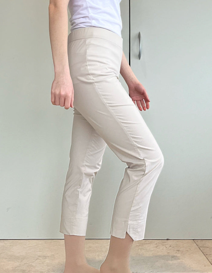 pearl cream trapeze fabric stretch trousers with 7/8ths length with notch split hemline and elasticated waist