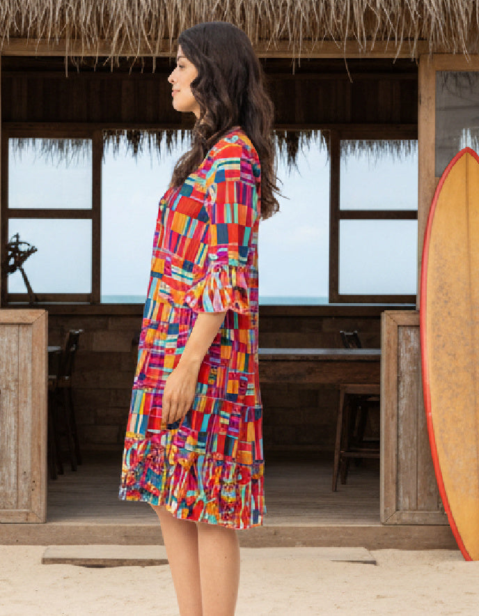 woman wearing multicolour cotton flared beach dress with sleeves