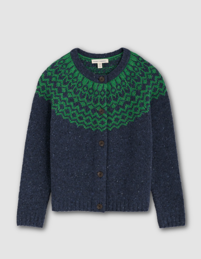 Blue and green patterned cardigan on a light gray background
