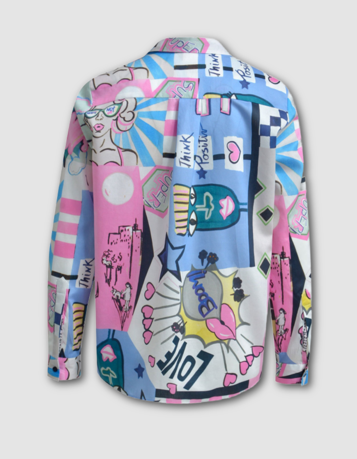 Colorful patterned shirt with abstract designs on a gray background