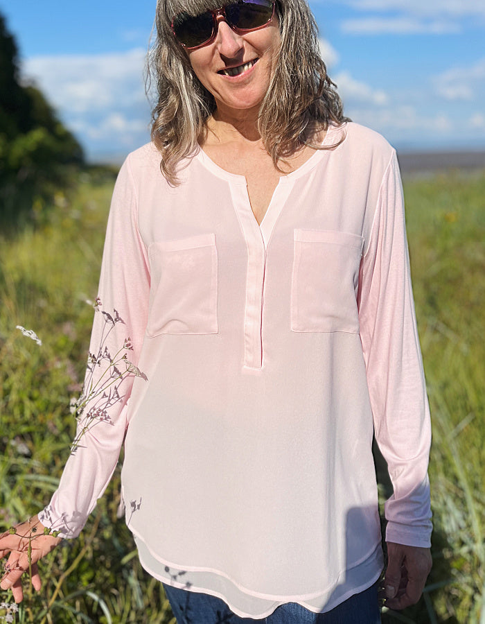 powder pink chiffon blouse with v-neckline and full length sleeves