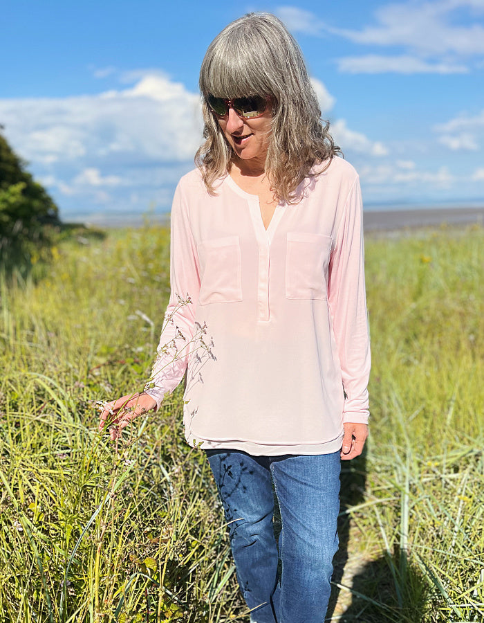 powder pink chiffon blouse with v-neckline and full length sleeves