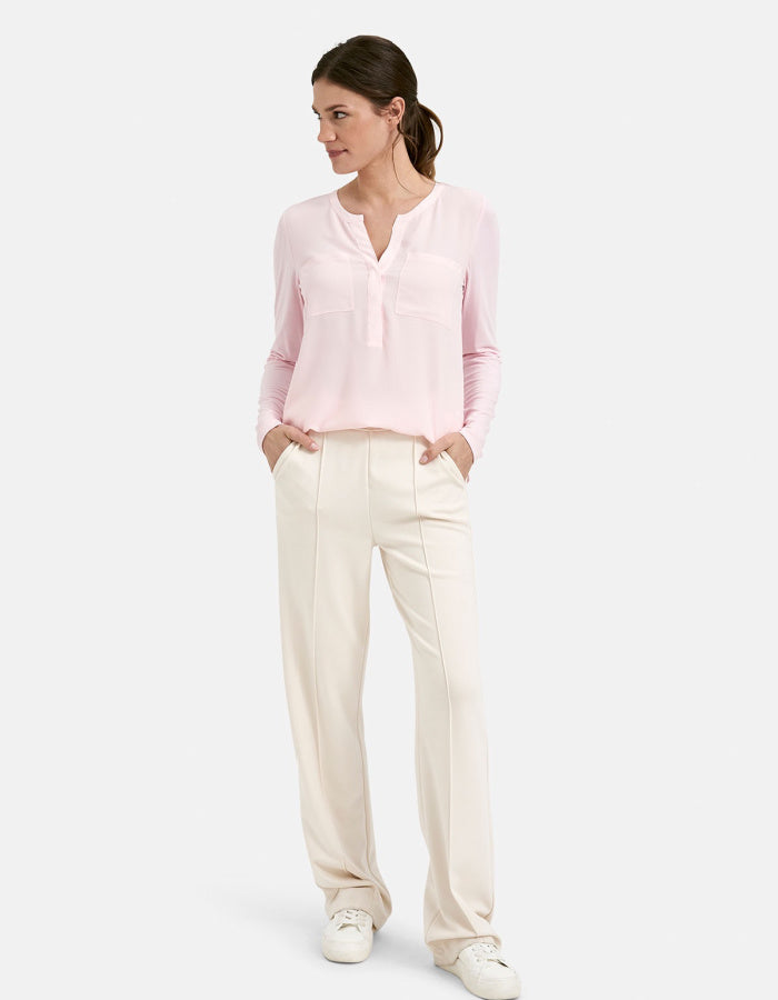 powder pink chiffon blouse with v-neckline and full length sleeves