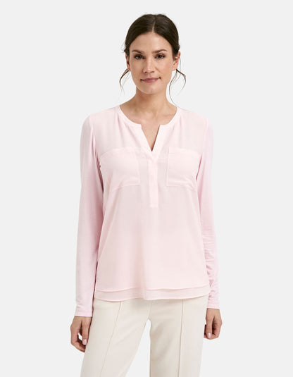 powder pink chiffon blouse with v-neckline and full length sleeves