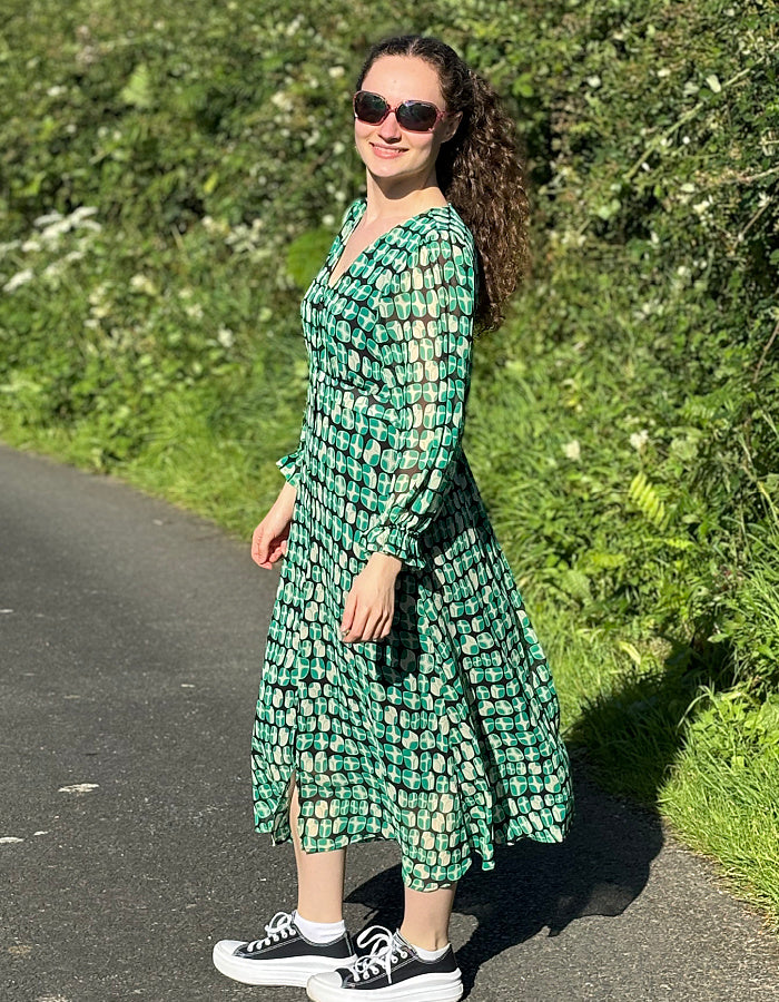 green geometric print midi dress