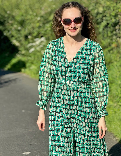 green geometric print midi dress