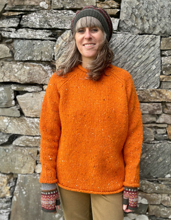 orange donegal tweed roll neck sweater