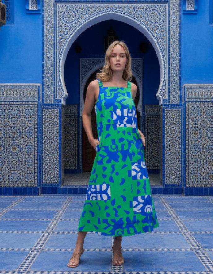 woman wearing blue and green graphic print sundress 