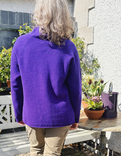 dark purple lambswool,long sweater with raglan sleeves and mock turtle neck. made in Scotland