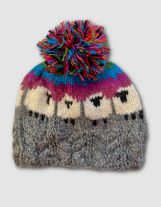 From the Source Sheep Bobble Hat with Cables in Rainbow