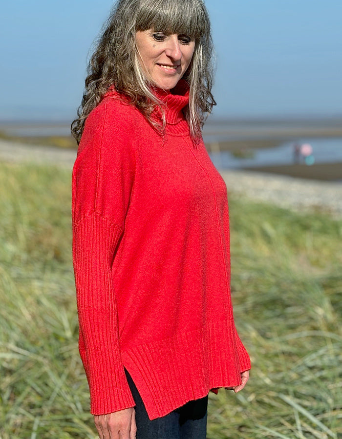 red wool free swing sweater with cowl neckline