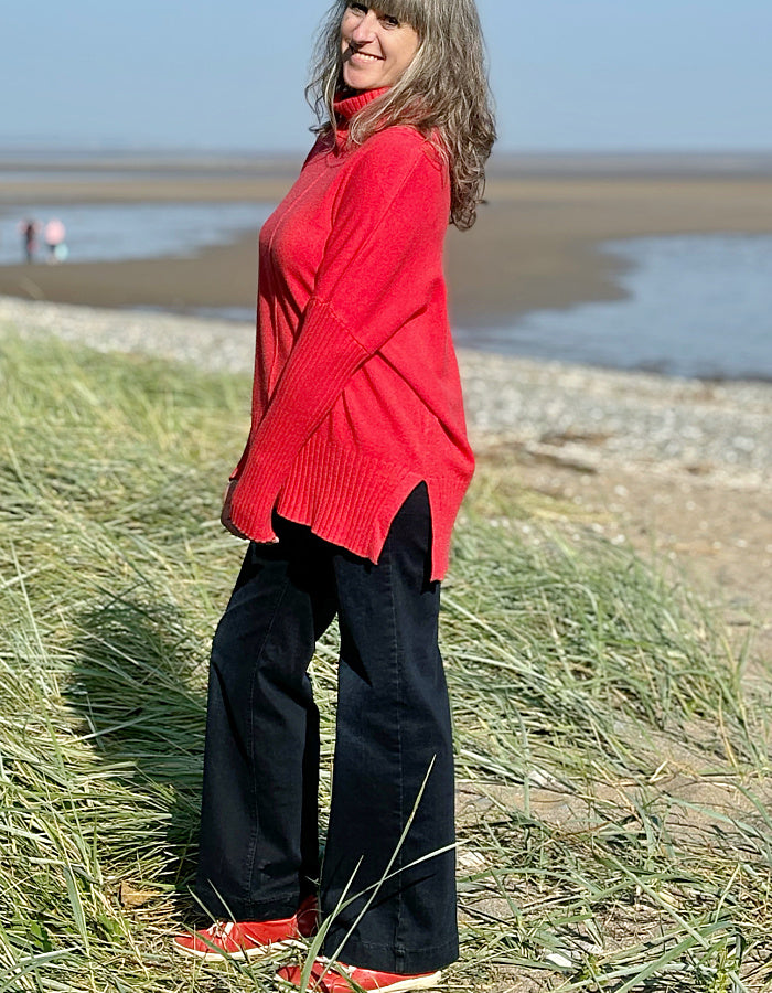 red wool free swing sweater with cowl neckline