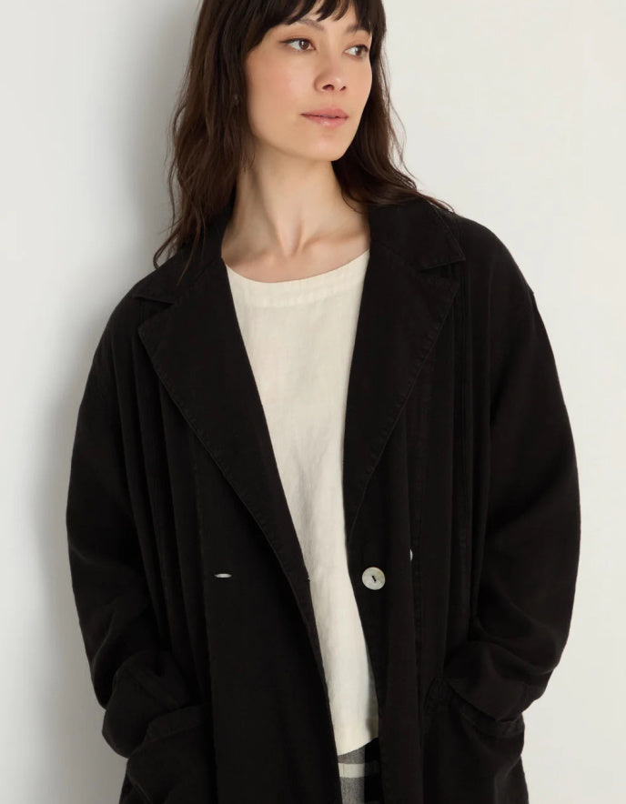 lady wearing black linen duster coat