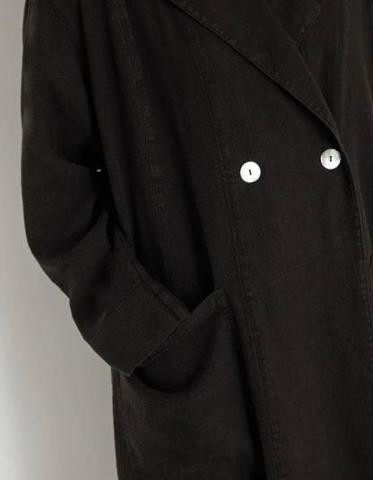 lady wearing black linen duster coat