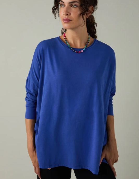 woman wearing loose fit blue t shirt