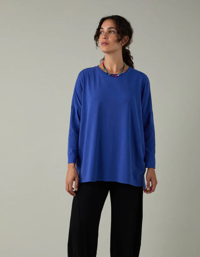woman wearing loose fit blue t shirt