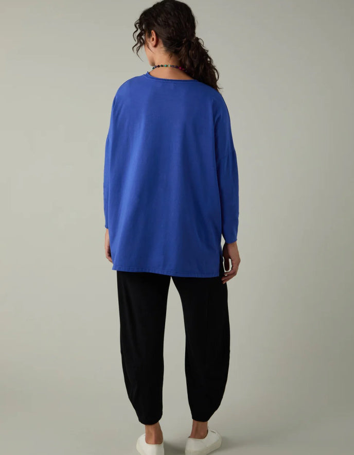 woman wearing loose fit blue t shirt