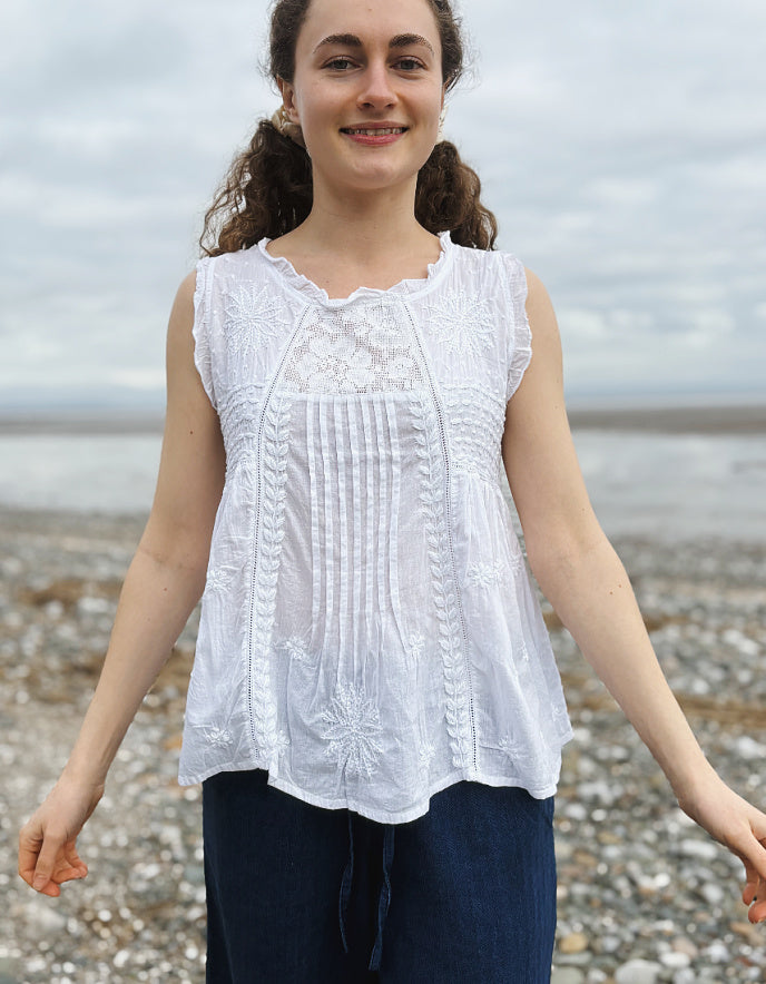 white cotton sleeveless embroidered top