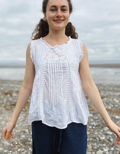 white cotton sleeveless embroidered top