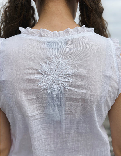white cotton sleeveless embroidered top