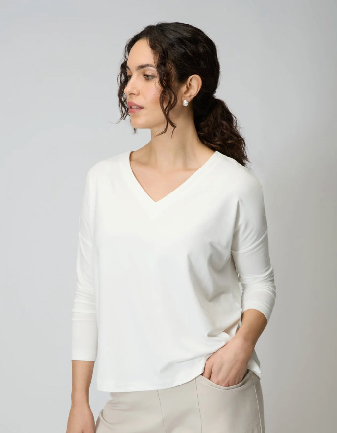 woman wearing off white v neck viscose jersey t shirt