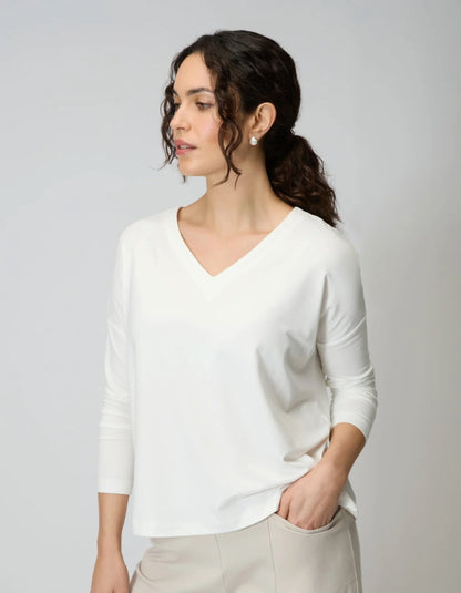woman wearing off white v neck viscose jersey t shirt