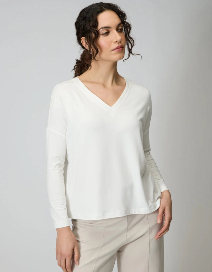 woman wearing off white v neck viscose jersey t shirt