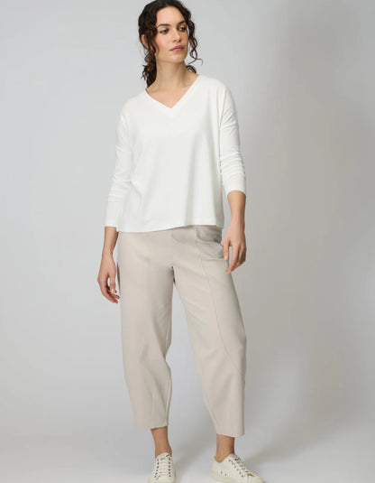 woman wearing off white v neck viscose jersey t shirt