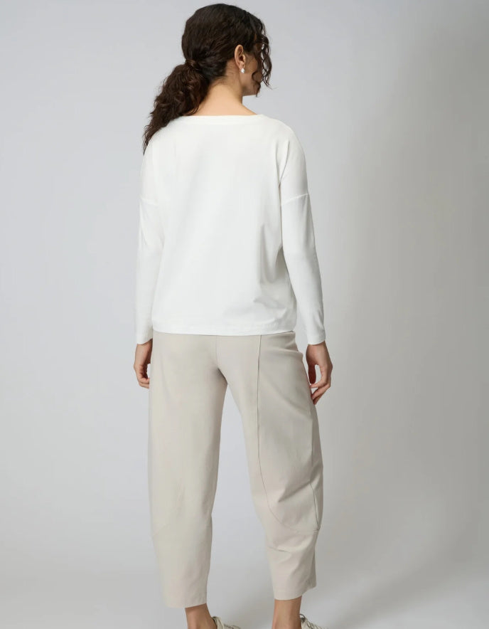 woman wearing off white v neck viscose jersey t shirt