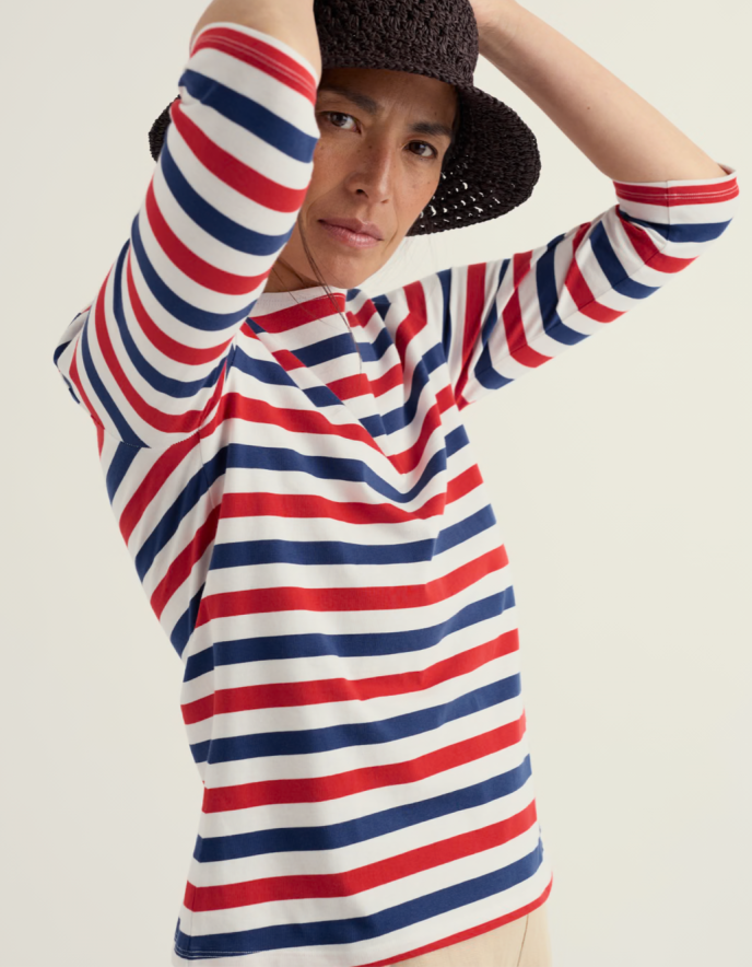 woman wearing striped red white and blue Breton striped cotton t shirt