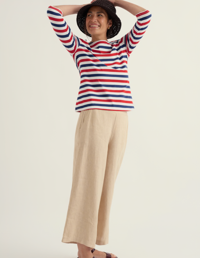 woman wearing striped red white and blue Breton striped cotton t shirt