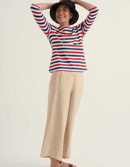 woman wearing striped red white and blue Breton striped cotton t shirt