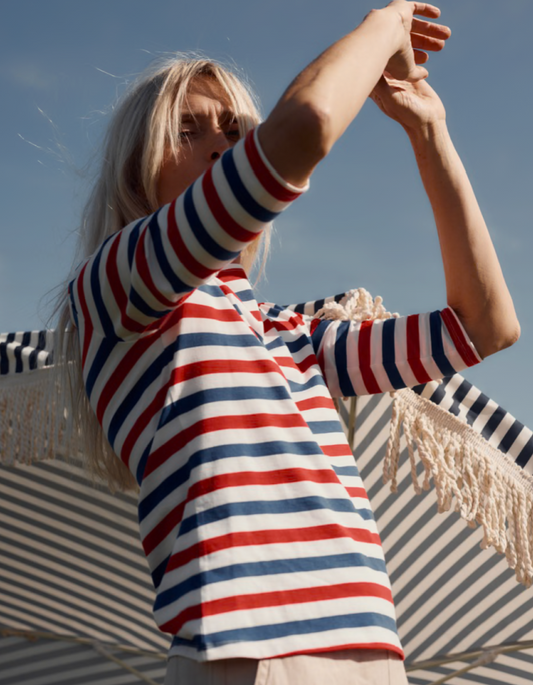 woman wearing striped red white and blue Breton striped cotton t shirt