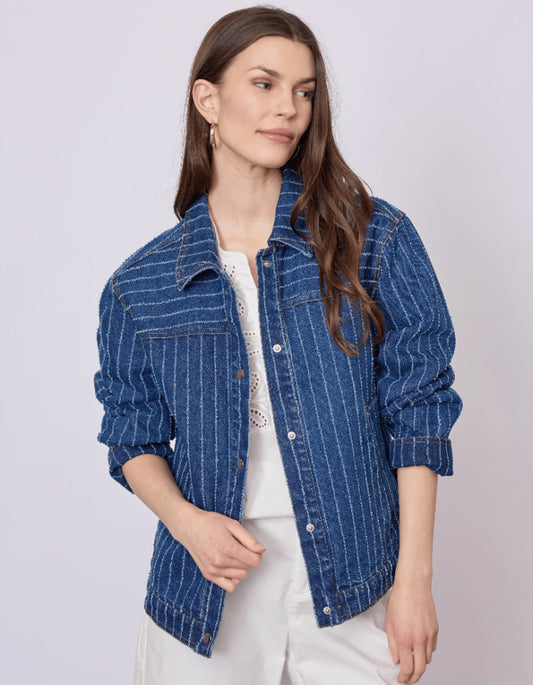 Woman wearing a blue striped jacket on a white background