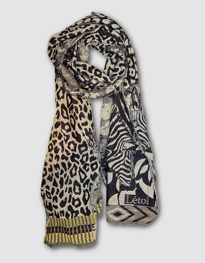 Scarf with leopard and zebra pattern on a light gray background
