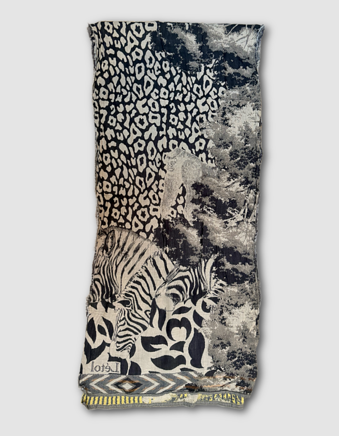 Scarf with animal print design on a light gray background