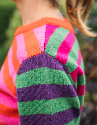 reversible wool crew necked striped sweater in pink, green orange and purple 