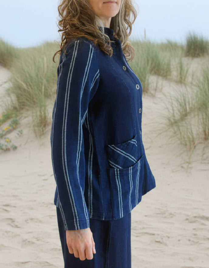woman wearing chambray denim shirt jacket with pinstripes